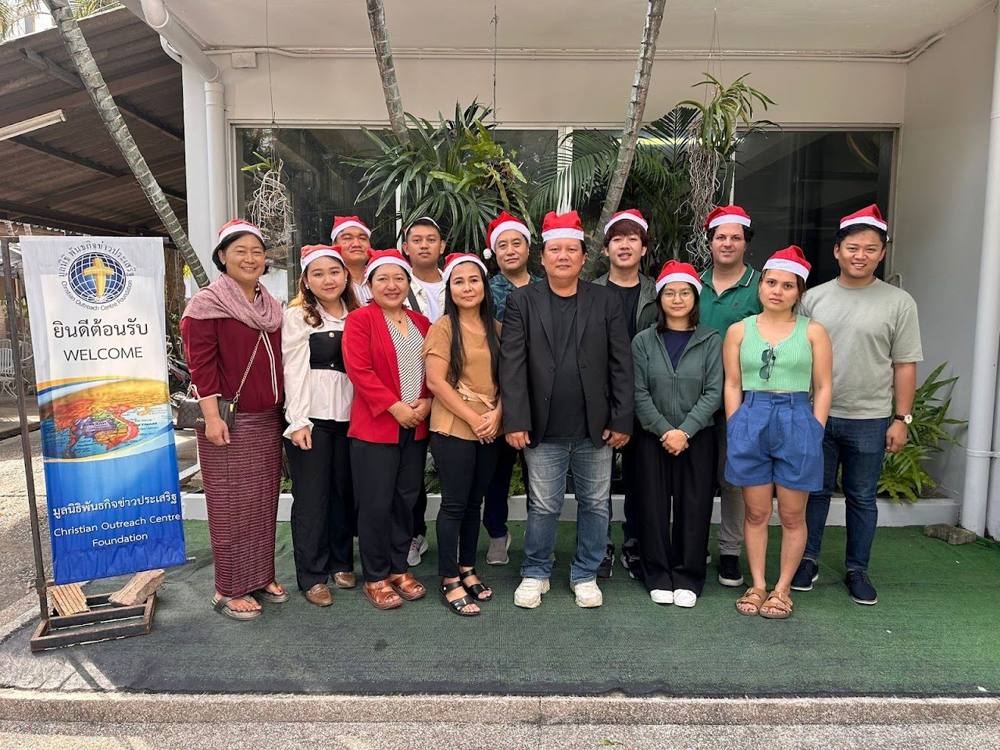 Christmas gathering celebration with fellow volunteers and the Chairman of the COC Foundation.